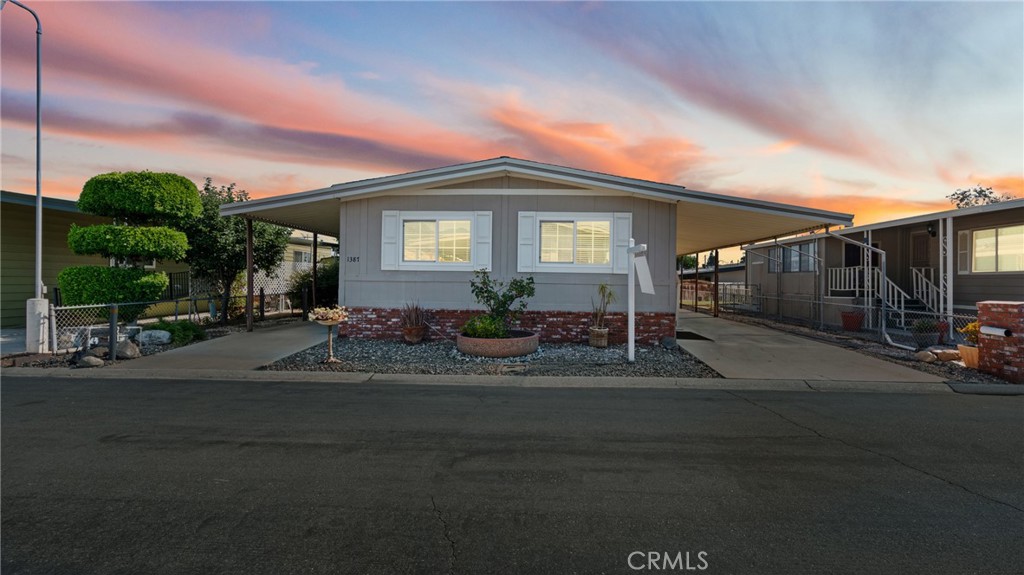 Are you Looking for a relaxing retreat to be able to call home? This 2-bedroom 2 bath mobile home in a 55+ community offers the perfect blend of comfort and amenities and awaits its new owner to call it their home. Imagine enjoying resort-style living with a sparkling pool, relaxing spa, and vibrant clubhouse to do lots of activities. Plus, unwind in nature with scenic green belts perfect for strolls or dog walks – it's the lifestyle you've been dreaming of. Plus, the home has been recently updated with fresh paint, new carpet, and vinyl flooring – move-in ready! Additional features include three sheds for extra storage, low-maintenance landscaping, and parking on both sides of the home – ideal for homeowners seeking convenience and functionality.