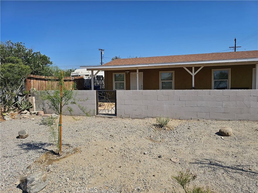 Welcome home to this charming, single-level 1-bedroom, 1-bathroom residence. Freshly painted throughout, it offers a clean, modern look that feels brand new. This south-facing apartment features approximately 620 sq ft of comfortable living space, including both a front and backyard—perfect for relaxing or entertaining. Inside, you'll find a stylish kitchen with a dining area and direct access to the backyard. Durable tile flooring runs throughout the home, making maintenance a breeze. The well-sized bedroom includes a ceiling fan and closet, along with additional ceiling fans and window coverings for comfort and privacy. Enjoy year-round comfort with a split A/C unit and a recently updated bathroom featuring a new vanity and sink. Rent includes water, gas, trash, and sewer. Available now—schedule a viewing today!