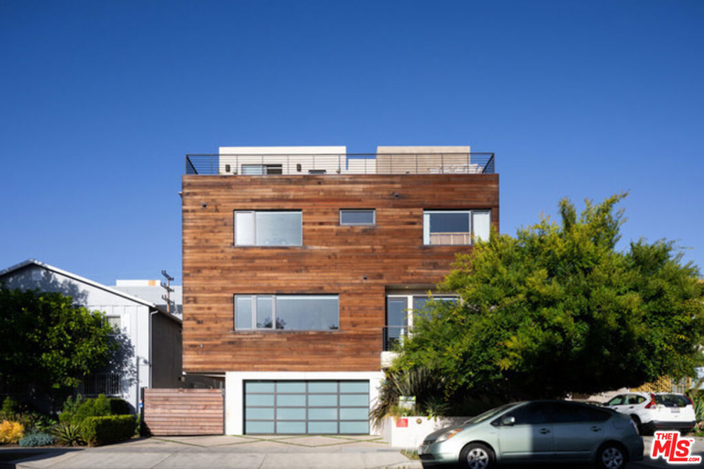 We are pleased to introduce for the first time for lease, this 3 bedroom townhouse, consisting of almost 1,900 square feet, and in one of LA's most desirable and sought after areas, with a 98 WalkScore and just a stone's throw away from The Grove, Farmer's Market, and countless other shopping and dining attractions. This home is sundrenched on every floor with automatic roller shades throughout and a large skylight in the center of the house. Central AC and heat, wood flooring throughout, with tile bathrooms, quartz countertops, bosch kitchen appliances, wine refrigerator, and white frosted glass kitchen finishes. This home was built to entertain, with a rooftop deck totaling over 600 SF with unobstructed expansive city views.