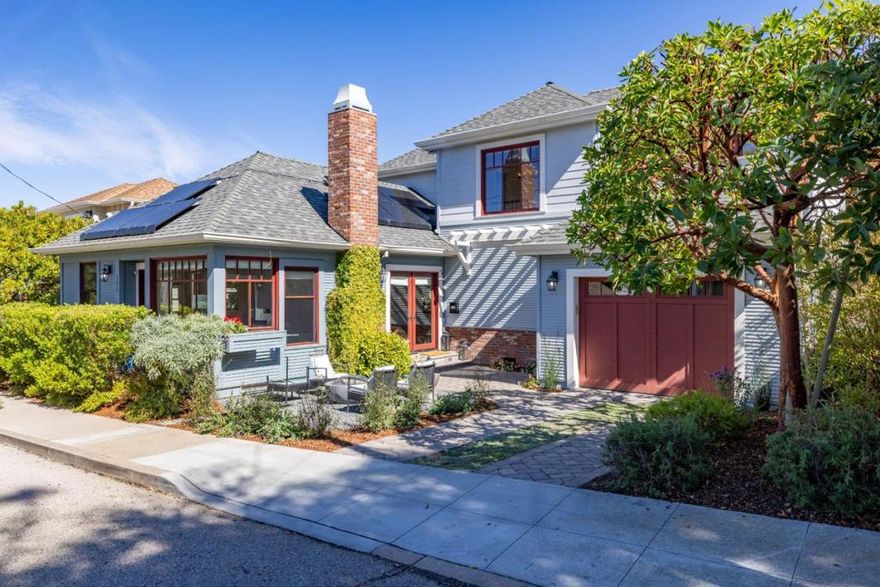 If Goldilocks wanted a home in Pacific Grove, she would surely choose this one. From its central location and tranquil feel to its flexible layout and deluxe finishes, everything about this turn-key treasure is "just right." Situated on a quiet, one-way street just half a block from downtown PG and fewer than two blocks from the Monterey Coastal Recreation Trail, here is a delightful property offering that oh-so-rare combination of total privacy and total proximity. Inside, relax in sun-drenched rooms, including an expansive open living room with high-ceilings, custom Roman shades, a smart fireplace, and seamless access to a truly exceptional gourmet kitchen. Pulling up to sip her porridge on pristine marble countertops, Goldilocks couldn't possibly offer anything less than her wholehearted approval of the top-notch appliances and amenities that are yours to discover and enjoy here, including a six-burner stainless steel Wolf range. At bedtime, while you wind down in your ground level primary suite, your guests and family members can have their pick of two additional bedrooms upstairs, one of which has a spacious balcony from which to fully appreciate your spot in this lovely neighborhood. Don't settle for less than your own fairytale ending. Here, you really can have it all!