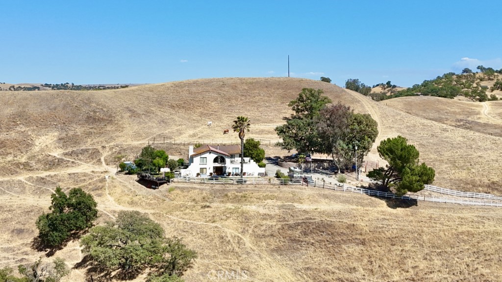 How About a “Real” Ranch in Dresser Ranch? All 32± acres are usable! Located just 8 miles east of Paso Robles city limits, this rare find offers endless possibilities for the buyer with a vision. The large, custom-built home features 4 bedrooms and 3.5 bathrooms, with plenty of space for a large family and guests. Dual living areas create excellent potential for multigenerational living or entertaining. From the yard—and especially from the second floor—you'll enjoy breathtaking views of the surrounding landscape. The property also includes a barn and pens for livestock. Fully fenced and currently pastured with cattle and horses, this is a true working ranch.
Enjoy peace, privacy, and panoramic vistas in this one-of-a-kind Dresser Ranch opportunity!