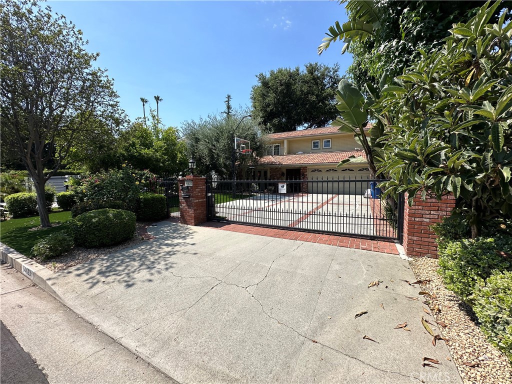 Welcome to this stunning European-inspired two-story residence in the heart of Sherman Oaks, offering nearly 2,900 sqft of elegant living space with a perfect blend of timeless design and modern upgrades. Featuring four spacious bedrooms and three designer-renovated bathrooms, the home boasts a chef’s kitchen with premium appliances, an expansive master suite with smart features, and multiple open living areas ideal for entertaining. Outdoors, enjoy a rare oversized resort-style pool with a 2.5m deep end, a full-size basketball half court, and a large backyard designed for relaxation or gatherings. Additional highlights include a two-car garage with Tesla charger, private gated entry, and smart home conveniences throughout. Immaculately maintained and move-in ready, this home is ideally located near premier shopping, dining, and freeway access in one of Sherman Oaks’ most desirable neighborhoods.