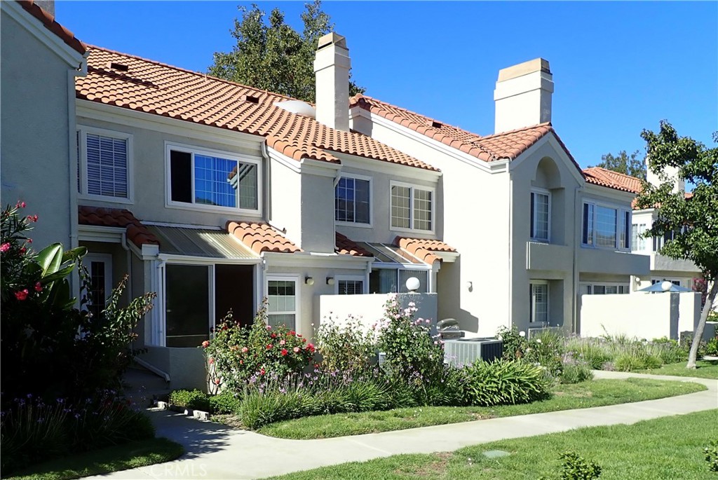 Panoramic Malibu Canyon views and highly upgraded throughout "Edinburgh" plan (largest in development) with creekside location within the Steeplechase Condominiums. Nobody living above or below this townhouse style unit with a private direct access double car garage. A parking permit for overnight parking a 3rd vehicle within this gated community is also included. Wood burning fireplace in living room. Must see kitchen with custom cabinets, stainless steel appliances including refrigerator, slab stone countertops, and must see lighting fixtures. Downstairs guest bath. Full size laundry room with washer/dryer included. All the windows and sliding door have been replaced with dual pane glass for energy efficiency. Private outdoor patio is perfect for table and bbq. Upper level consists of two bedrooms each with their own full bath. The front bedroom has incredible panoramic views facing east of the oak covered hills and scenic canyon along with an oversize tiled walk-in shower. 2nd bedroom also has a very attractive tiled tub/shower. Garage has built-in storage cabinets, work bench, and tiled flooring. Very rare opportunity to find such an attractive property and location! Award winning Las Virgenes School District (Lupin Hill Elementary, A E Wright Junior, Calabasas High). Shopping, dining, and Erewhon Organic Market only 1 block away at Agoura Road. Just down the street from great outdoor recreation at Malibu Creek State Park and only 8 miles to the beaches of Malibu.