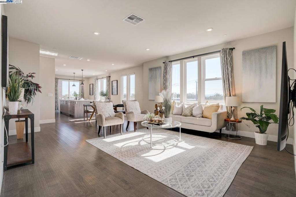 Don’t miss this stunning, upgraded condo located in Fremont’s highly desirable Innovation community. Built in 2020 by Shea Homes, this 3-bedroom, 2.5-bath home features a bright, open floor plan that seamlessly connects the spacious living room, dining area, and modern kitchen—complete with high-end finishes and stainless steel appliances. Enjoy indoor-outdoor living with a private balcony perfect for relaxing or entertaining. It's conveniently located within walking distance to the Warm Spring BART station and offers easy access to highways 680 and 880. The Innovation community offers fantastic amenities, including a community clubhouse and BBQs, a state-of-the-art fitness center, a swimming pool, and a community solar system. Plus, a newer elementary school and a four-acre park are located within the community for you and your family to enjoy.