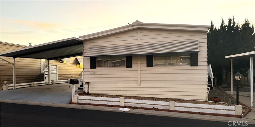 Looking for the perfect place to retire, well look no more, Villa Magnolia is a beautifully maintained senior living community that offers comfort, connection, and convenience with a low space rent of $1,175 a month. Residents enjoy a beautiful clubhouse featuring a cozy fireplace lounge, swimming pool, relaxing spa, modern fitness room, billiard room, and a fully equipped kitchen for gatherings and events. This charming 3 bedroom, 2 bathroom home is being offered for the first time in 30 years and is ready for your personal touch! The spacious floor plan includes a large living room that opens o a dining area with a built in china cabinet, a bright kitchen, and a versatile family/den area currently used as an additional dining space. You’ll also find a separate laundry room and well sized bedrooms for comfortable living.  Enjoy the outdoors with a covered front porch, a large covered carport, and a private side yard perfect for relaxing or light gardening. All this at an exceptional price — in a beautiful, friendly community designed for easy living and active lifestyles. Additional features: The water heater is 1 year old, and the a/c condenser is 1 1/2-year-old. Villa Magnolia is close to Kaiser Permanente, Tyler Mall, 91 freeway and additional restaurants and shopping.