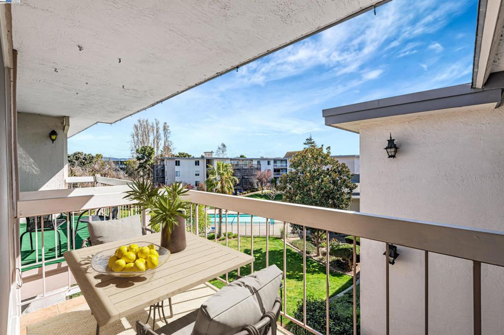 Welcome To Alameda's South Shore Beach & Tennis Club Condominiums Where Beauty, Comfort and Island Coastal Lifestyle Come Together In A Gated Community. Private, Rarely Available Top Floor Unit. Open Living Floor Plan. Beautifully Upgraded. New Carpet, Bamboo and Tile Flooring. Custom Lighting Throughout. Bedroom Boasts An Amazing Built In Closet System, En Suite Updated Bathroom and Separate Dressing Area. Modern Kitchen Features Stone Countertops, Breakfast Bar and Stainless Appliances. Perfect For Cooking and Entertaining. Sunlit Living Room Opens To The Balcony With Serene Partial Views of The Hills and Lush Greenery. A Tranquil Space For Morning Coffee, Al Fresco Dining or Simply Unwinding. Enjoy The Inviting Pool, Clubhouse, Fitness Room, Saunas and Attached Secured Garage. Just A 5 Minute Walk To Crown Beach, Washington Park, Bayside Walking Trails, Bike Lanes, Dog Park, Kite & Windsurfing. Stroll and Explore Alameda's Charming Shops, Diverse Dining, Arts, Live Music and Farmer's Markets. Visit Alameda Point, The East Bay's Go To Destination For Cafes, Restaurants, Wineries, Breweries & Events. Easy Access To Alameda Ferries For Commutes To San Francisco, Public Transit and All Major Highways. Make This Condo Your Island Home!
