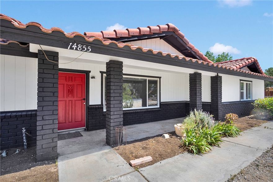 Welcome to this beautifully remodeled 4-bedroom, 3-bathroom home with an attached 1-bedroom, 1-bathroom guest suite featuring a full kitchen, ideal for guests or rental income. Situated on over an acre of land, this property offers ample space for RV parking, toys, a pool, or pets. The home shines with modern upgrades, including new windows, cabinets, flooring, bathrooms, fresh paint, and more. Energy efficiency is boosted by two sets of solar panels. The spacious 3-car garage includes attached storage, easily convertible to a 6-car garage or additional storage. Centrally located near freeways, shops, schools, parks, and upcoming establishments, this home combines luxury, versatility, and prime location!