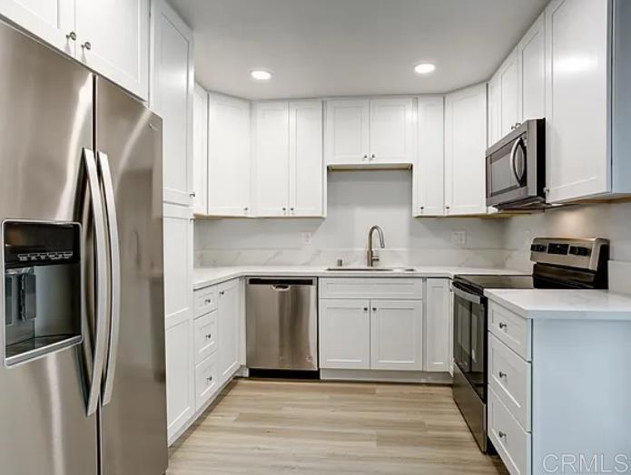 Discover refined coastal living in this impeccably updated 2-bedroom, 2-bathroom townhome with in-unit washer and dryer, nestled in an exclusive gated community just minutes from Oceanside's pristine beaches and vibrant downtown. This sophisticated residence offers the perfect balance of seaside tranquility and urban accessibility, with Highway 5 and the area's finest dining, shopping, and entertainment all within easy reach. Spanning 1,000 thoughtfully designed square feet across two levels, this contemporary retreat showcases premium modern finishes throughout. The chef-inspired kitchen gleams with sleek stainless-steel appliances, while strategically placed ceiling fans ensure perfect comfort in every season. Your security and peace of mind are paramount, with a private gated entrance providing an additional layer of exclusivity. Pets are warmly welcomed here! Property Highlights: • Designer renovations with high-end modern finishes • Sophisticated two-story layout offering enhanced privacy • Secure gated community environment • Pet-friendly policies for complete family living • Premium stainless-steel appliance package • In-unit laundry facilities Don't miss this rare opportunity to embrace the coveted Oceanside lifestyle in a home that effortlessly blends style, function, and location. Experience the best of Southern California coastal living today! Enjoy a convenient location just minutes from the Oceanside Pier, Harbor, and a wide variety of restaurants, shops, and public transportation. This pet-friendly community is ideal for those looking to experience the best of coastal California living in a setting that’s both vibrant and relaxed. Income and credit requirements apply. Contact listing agent for details.