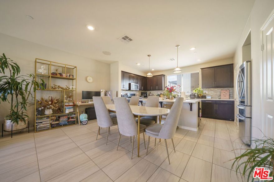 This is your opportunity to enjoy a modern townhouse in a gated community!  This spacious home is over 1,800 square feet and offers 3 bedrooms and 4 bathrooms (with 3 bathrooms en suite).  Enter from the two car garage or private patio to a first floor level with a separate bedroom and bathroom suite.  Large open floorplan with a kitchen, living area, and 1/2 bath are located on the main level. The kitchen has a large island, stainless steel appliances, sleek cabinets, and a modern refrigerator. The upper levels have 2 bedrooms and 2 full bathrooms.  In unit laundry.   Private 2 car garage plus guest parking available in the community, which also includes a playground and picnic area. Centrally located in Gardena with easy access to the I-110 and surrounding areas, shops, and restaurants.  Available to move in November 1, 2025.