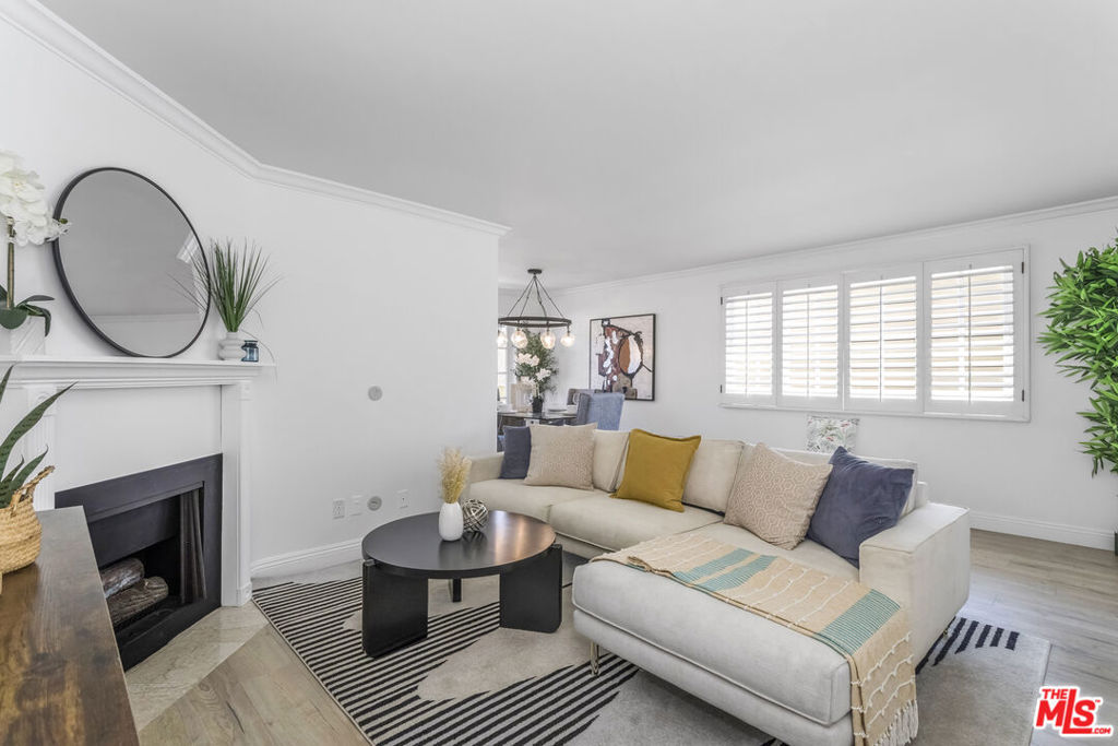 Sunny & bright, turnkey condo, with an A+ location, in the most desirable section of Ocean Park. This quiet, corner unit is flooded with light from both south & west facing windows. It has 2 nicely sized bedrooms, 2 full baths, a cozy fireplace in the living room & a balcony just off the kitchen for morning coffee. Other features include engineered wide plank french white oak floors, freshly painted, plantation shutters, 2 parking spots just below the unit & a low HOA fee. The building is well run & tucked nicely into the neighborhood, just 4 blocks to Main St & & 5 blocks to the beach. Enjoy the year round ideal climate, an active day life - walk, bike, swim & sun bath, as well as an active nightlife - happy hours, dining & an evening stroll on Main St. People seek out Ocean Park from all over the region making this unit a great investment opportunity as well. Offers due by 08.06.2025 / 5 pm.