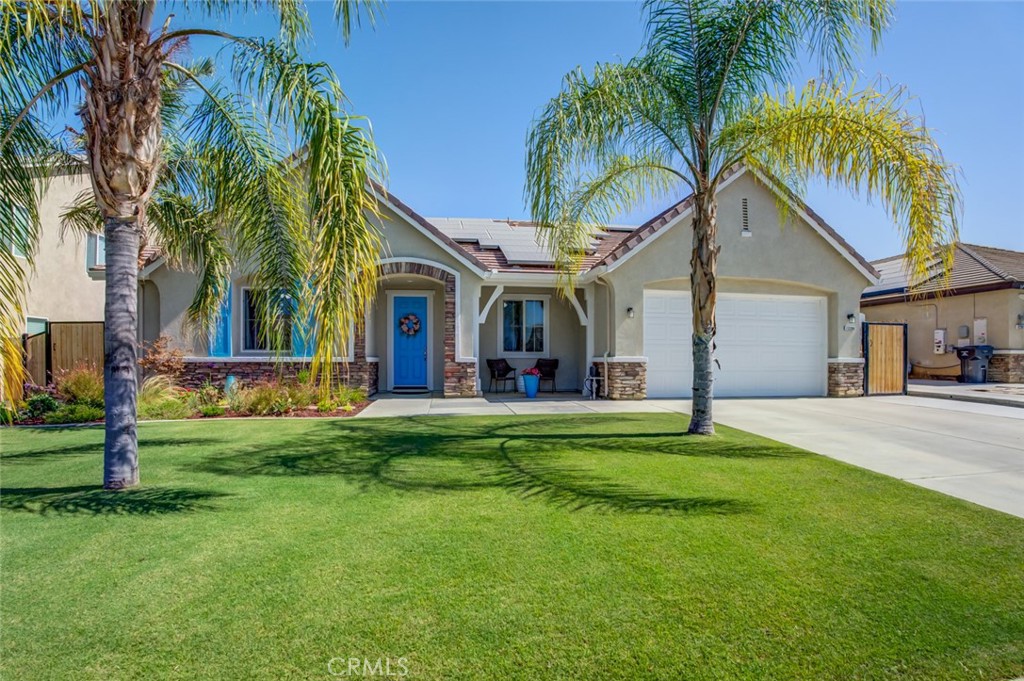 Why would you want new construction when you have this beautifully updated home in an established neighborhood? This 4 bdrm 3 bath split-winged home is quite spacious at 2608 sq ft. w/ a tandem 3 car garage on a massive 1/4 acre lot. Enjoy the great curb appeal w/ a delightful pop of color, well-maintained front yard & additional concrete in the driveway. No expense has been spared on the numerous updates & upgrades including newer paint inside & out, newer plank flooring and carpet throughout. You will like the thoughtful layout of this home with a long hall dividing the guest bedrooms and both guest bathrooms. Two of the guest bdrms are connected by a bathroom & conveniently located next to the laundry room. The third guest room is just across the hall from the guest bath which has been updated. The hallway continues down to the formal living & dining rooms across from each other with updated lighting & fans, then the family room which is directly across from the gorgeous updated kitchen boasting quartz counters, sink, faucet & white cabinets. The end of the hallway goes into the enclosed patio. A separate hallway between the dining and kitchen leads to the primary bedroom suite & bath. The primary bath has a soaking tub/shower, dual sinks with a separate vanity area & large walk-in closet. The backyard is low maintenance w/ extended concrete reaching both sides of the home, a well-manicured lawn & newer fencing. All that is left for you to do is to buy it and move in!