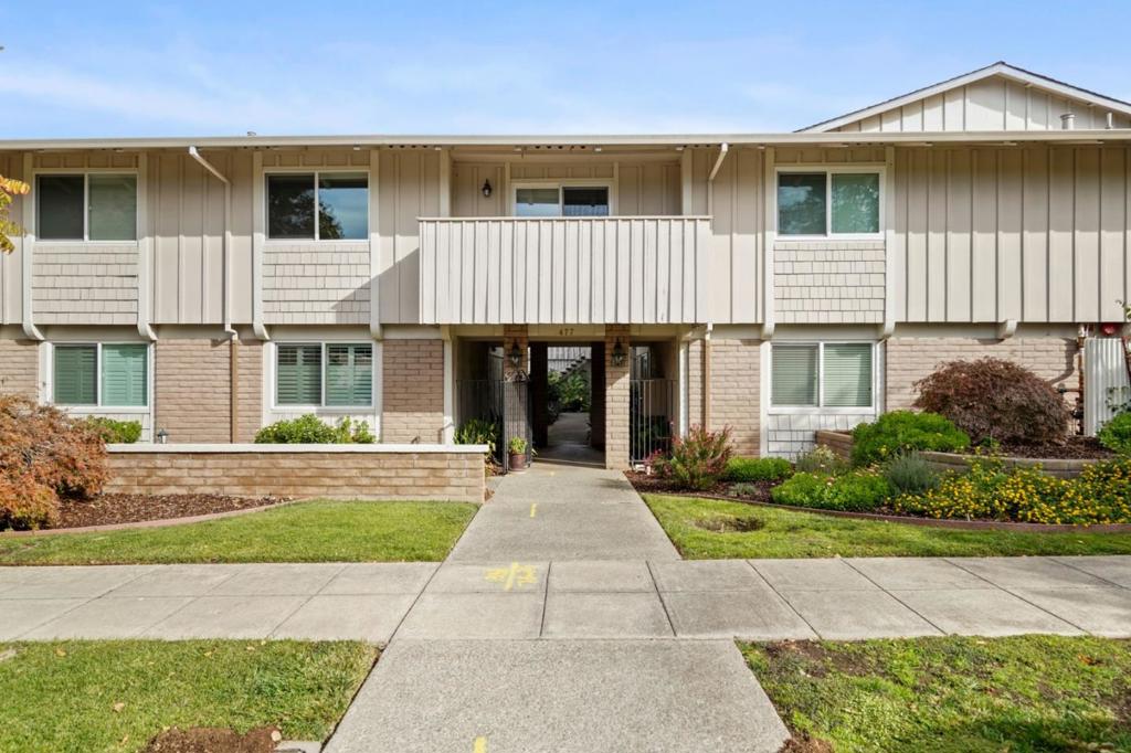 Enjoy stylish living at this rarely available building with only 9 condominiums just 3 short blocks from the Village. Top floor location and beautifully remodeled throughout with engineered wood or tile floors in every room. Large living/dining room combo with gas-log fireplace, private deck, wet bar, and wiring for surround sound. Remodeled kitchen with granite counters and stainless steel appliances. Lovely primary suite with customized wardrobe storage. Both bathrooms are luxuriously remodeled with contemporary designer style. Numerous smart home technology features for comfort and convenience. Concealed laundry, garage parking for 1, updated electrical can accommodate a backup generator. Wall unit air conditioning. Community pool. Great for starting out, moving up, or downsizing. Excellent Los Altos schools.