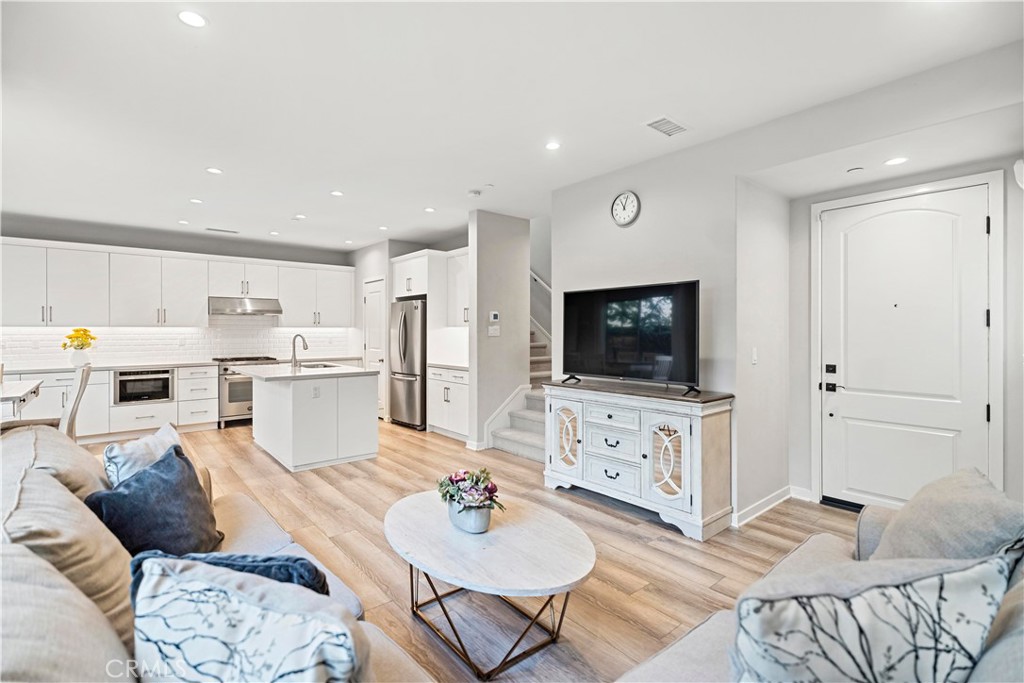 Welcome to this beautifully upgraded detached condo located in the desirable Portola Springs community of Irvine. This bright home features 3 bedrooms, 2.5 bathrooms, and a spacious upstairs loft, perfect for a home office or media area.
The open-concept main level includes a living room and a gourmet kitchen equipped with white shaker cabinets, quartz countertops, stainless-steel appliances, and a center island. Upstairs, the luxurious primary suite features abundant natural light, dual sinks, and a walk-in closet. Secondary bedrooms are well-sized with modern finishes.
Enjoy a private patio ideal for outdoor dining, a 2-car attached garage, and access to resort-style amenities including a pool, spa, parks, playgrounds, and sports courts. Located in the award-winning Irvine Unified School District (Portola High School), this move-in-ready home combines comfort, style, and convenience in one of Irvine’s most sought-after neighborhoods.