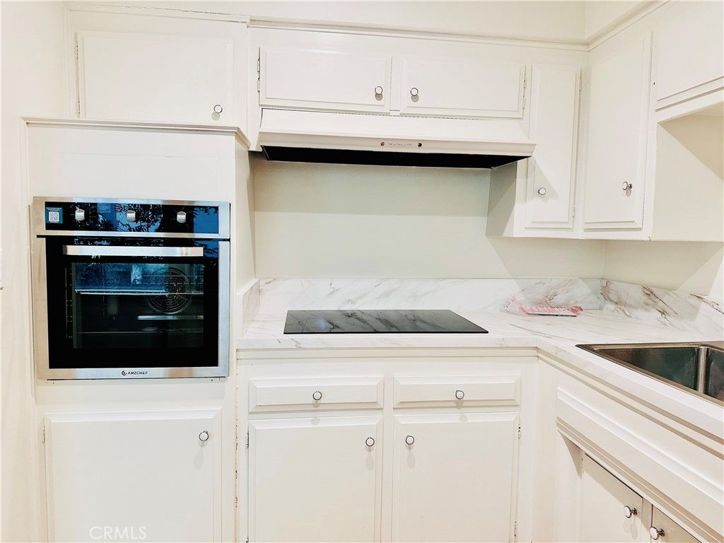 Photo of 239 S Barrington Avenue #F8, Los Angeles, CA 90049 (MLS # TR26074246)