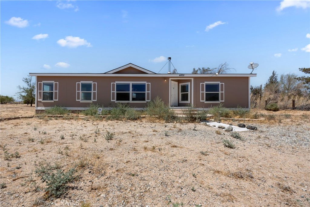 2.5 Acres • Private Well • Endless Possibilities! - Discover your slice of West Lancaster freedom at 48011 93rd St W! This charming 3BR/2BA single-story home sits on flat, usable 2.5 acres zoned LCA11 Light Agricultural—perfect for horses, gardens, orchards, or hobby farming. A private water well means independence and potential utility savings, while the open floor plan, vaulted ceilings, and cozy fireplace make everyday living comfortable. Just minutes from shopping, dining, and freeway access, you’ll enjoy rural living without sacrificing convenience. Move-in ready and full of potential—bring your vision and make it yours!