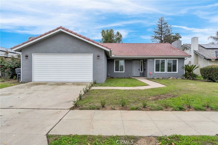 Located at 2808 Riverview Drive in Madera, CA, this attractive ranch-style home is ready for its next chapter. The living room is bright and airy, highlighted by a high vaulted ceiling with beautiful exposed beams that create a sense of openness and architectural character. Natural light fills the space, making it warm and invitingperfect for everyday living or entertaining.

The kitchen is both functional and stylish, featuring a kitchen bar and peninsula that provide ample space for meal preparation and casual dining. Stone countertops, shaker cabinetry, a built-in stovetop, and a designer backsplash add both elegance and practicality.

This home offers four bedrooms and two bathrooms, including a private primary suite with an ensuite bathroom. The second bathroom features a double vanity and a walk-in shower, offering comfort and convenience for family or guests. An open floor plan enhances the flow of the home across 1,576 square feet of living space, while a dedicated laundry room adds everyday ease.

Outside, enjoy a covered patio and fenced backyardideal for relaxing, entertaining, or outdoor activitiesall complemented by a durable tile roof.

The property is located within the Madera Unified School District, with nearby schools including Lincoln Elementary School, Thomas Jefferson Middle School, and Madera High School (buyer to verify school assignments).

This well-maintained home offers a thoughtful blend of comfort, functionality, and style in an established Madera neighborhood.