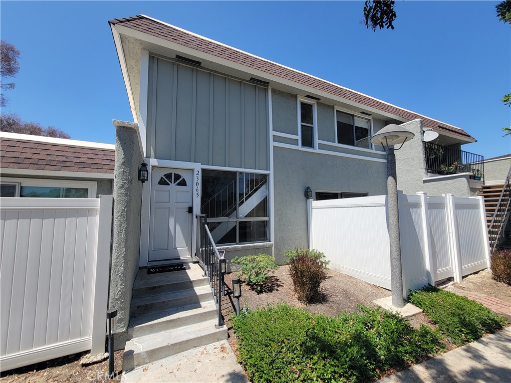 Welcome home to this 3 bedroom, 1.5 bath condo available for lease in the heart of Mission Viejo. Situated in the rolling hills of the Aliso Villas Development, this home features Wood-like laminate floors, tiled kitchen, cozy fireplace, and stainless steel appliances (no refrigerator). Retreat to the upstairs where you will find all three bedrooms with 1 full bathroom. Washer/dryer is conveniently located inside the one car garage where you will find plenty of storage. Unit includes 2 dedicated parking spots (1-car attached direct access garage and 1 dedicated uncovered parking spot). Tenant obligations for utilities include electricity, gas, water, cable/internet. HOA includes garbage, community patrol, and common area landscaping. Because this unit sits on a hill above other units, you can enjoy gorgeous views from the patio as well as from the front of the home. Community amenities include a spa, swimming pool, and access to Lake Mission Viejo (2 private beaches)!