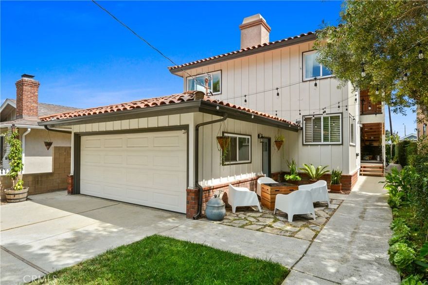 Stunning, spacious, and move-in ready—plus a phenomenal location with top-rated Torrance schools! What more could you ask for? Welcome to this beautiful Walteria CONDO offering 3 bedrooms, 1-3/4 bathrooms, and 1,427 sq. ft. of stylish living space. This is the ***UPPER UNIT*** of a rare 2-on-a-lot building, and comes with its own private 2-car driveway and a private 2-car garage—no shared parking hassles here! No shared walls and no one above you! Step inside and you’ll be greeted with sunlight streaming through dual-pane windows on all sides, framing views of the city and the Palos Verdes Hills. The spacious living room, anchored by a charming stone-surround fireplace, flows seamlessly into the dining area and kitchen, making it perfect for entertaining. The kitchen is a showstopper with sleek black cabinetry, granite counters, a subway tile backsplash; appliances include a 5-burner cooktop, wall oven, dishwasher, and a black Samsung Bespoke refrigerator. Just off the kitchen, you’ll love the convenience of a separate laundry room with side-by-side washer/dryer hookups and pantry space. Down the hall, A BRAND NEW FULL BATHROOM features a wood vanity with a white ceramic top, soaking tub, and stylish finishes. The spacious primary suite easily accommodates a king-size bed, boasts a full wall of cedar-lined closets with organizers and mirrored doors, and includes its own private ¾ bath with an updated vanity and large stall shower. Two additional bedrooms—one with a walk-in closet—offer plenty of flexibility. Throughout the home you’ll find thoughtful design touches that give it a cool, inviting vibe: from the curated light fixtures with a boho flair to the chic wall plates on every switch. Add in abundant storage (including a built-in library), central heat, and a private water heater, and you’ve got comfort and convenience at every turn.  And then, of course, there’s the location: walk to a top-rated elementary school, benefit from the highly regarded South High School, enjoy nearby shops and dining, and have easy access to major employment hubs. This condo truly has it all—style, space, functionality, and an unbeatable address. Don’t miss your chance to call it home!  ****THIS PROPERTY QUALIFIES FOR A $20,000 COMMUNITY GRANT THROUGH CITIBANK'S LADDER UP PROGRAM!!!****