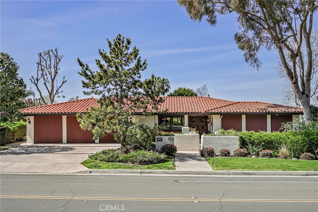 Experience the very best of coastal living in this move-in ready home where privacy, peace, and breathtaking views come standard. Nestled above the ocean, this residence is so private you’ll feel comfortable sleeping with the blinds open to star-filled skies and vibrant sunsets. Step through the grand double doors into an expansive, light-filled open floor plan that blends elegance with ease of everyday living. Walls of glass invite the ocean and hillside views into nearly every room, while the wraparound deck with built-in outdoor kitchen and retractable, lighted awning is perfect for entertaining day or night. The main level is designed for effortless single-level living. The oversized primary suite boasts its own balcony access, dual walk-in closets, and spa-like bath with freestanding tub and dual vanities. Just steps away from the main living area the heated pool and spa extend directly from the heart of the home—your own serene sanctuary for lounging, swimming, or starlit soaks. Downstairs, guests are treated to comfort and privacy with a second en-suite bedroom plus two additional spacious bedrooms that share a Jack & Jill bath. Bonus rooms offer endless flexibility for an office, yoga studio, or playroom. This home truly embraces both grand entertaining and quiet relaxation—from hosting fifty-plus guests in the lush lower garden to cozy family movie nights. The three-car garage, solar panels, EV charger, wine cellar, and fiber optic internet ensure modern convenience meets timeless luxury. Warm wood flooring, custom details, and thoughtfully designed spaces make this a home where you can simply move in, relax, and begin your coastal dream life.