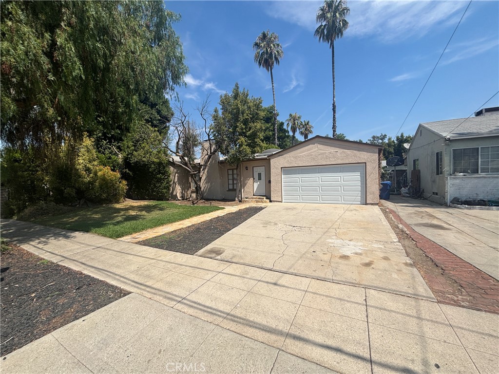 Charming opportunity in the heart of Van Nuys! This 3-bedroom, 2-bath home offers 1,398 sq ft of living space on an expansive 9,599 sq ft lot with an attached garage, located within the Historical Zone Overlay. The spacious lot provides excellent potential for an ADU or other expansion, while the home itself is perfect for a remodel to live in, a fix-and-flip project, or a long-term rental hold. Some foundation issues may exist—no reports on file—so buyers are encouraged to conduct their own inspections. Don’t miss your chance to bring new life to this property and unlock its full potential! Call your Realtor to schedule a tour and make an offer today!