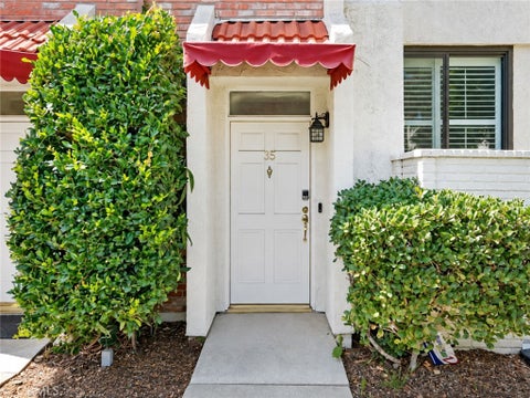 Photo of 6540 Hayvenhurst Avenue #35, Lake Balboa, CA 91406 (MLS # OC26197162)