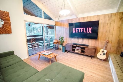 Photo of 29591 Sugar Cone Lane, Twin Peaks, CA 92391 (MLS # CV26005231)