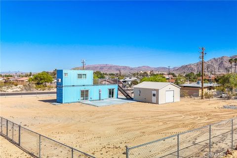 Photo of 72473 Desert Trail Drive, 29 Palms, CA 92277 (MLS # JT25109444)