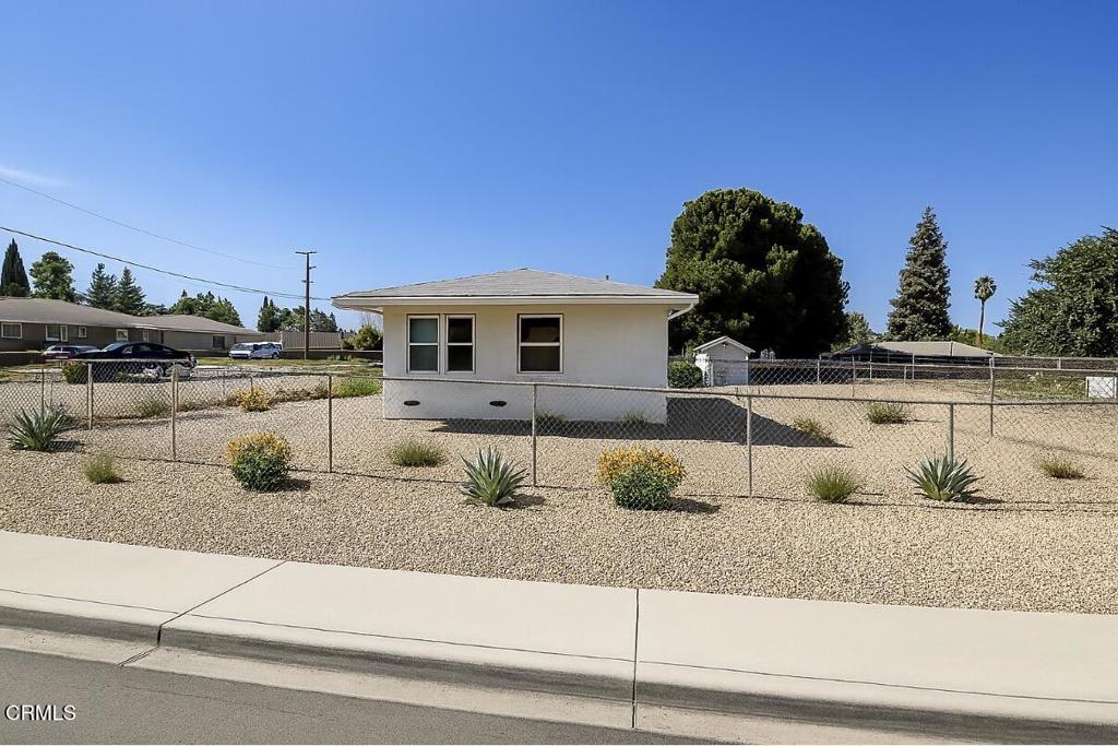 Charming Single-Story on Expansive Corner Lot !! Welcome to this 2 bedroom, 1 bath home offering over 1,500 sq. ft. of living space on a huge corner lot at Bamboo & Stanley in Bakersfield. A true diamond in the rough, this property is brimming with potential--ideal for buyers looking to update and add value. The spacious lot provides room and possibilities for a future pool, RV, rental income, ADU, making it a fantastic investment opportunity! Inside, the kitchen opens directly to the backyard, while outside you'll find excellent parking with a long driveway, covered carport, and additional storage room accessible from the rear of the home. Why build new when you can purchase for less than replacement cost? With so much space and possibility, this home is ready for its next chapter. Don't miss your chance to make it your own! Offer Today!