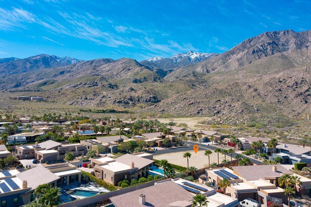 PREMIUM CORNER LOT with the BEST orientation perfect for unobstructed south & west MAJESTIC MOUNTAIN views (the best views in town). This lot is inside the luxurious Alta, an architectural award-winning gated development in South Palm Springs. THIS is the LAST and ONLY VACANT LOT STILL AVAILABLE (community is entirely built out). Situated in the most prestigious/premium location in the development, this is the 2nd largest lot in the community (almost half an acre/19,166 SqFt). This lot comes w/ incredible architectural plans that the famous Narendra Patel (the original architect hired to design those acclaimed homes) recently designed specifically for this lot. You OWN the land. All the utilities are underground and stubbed to the lot. Sewer, street & curbs are in. Pad is certified. The seller has done a lot of leg work including paying for landscape drawings and preliminary city permits (on file for this design). ALTA has 67 lots behind gates with a low monthly HOA of $245/month. The average home in Alta is a 3 BD + Den, 3.5 BA, around 3,728 SqFt, and on a 15,000 lot. This lot is ready to go! Adjacent to 2 golf courses, surrounded by renowned hiking and biking trails, just a few minutes to the thriving center of downtown, shopping, fine restaurants, hip bars, wine clubs, art galleries and museums. This is your rare opportunity to build your DREAM home in one of the best locations in all of Palm Springs.
