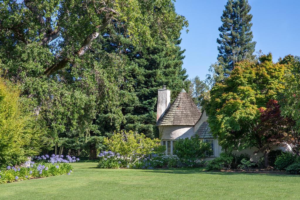 Outstanding opportunity to renovate and/or build in the heart of central Atherton just blocks to Menlo Circus Club. Deep 2-acre lot (approx. 205.14 x ~424.79) with vast sun-swept land. The existing Tudor residence is 3-bedroom and 3-bath (down to the studs) plus a 1-bedroom guest house. Complete privacy from the street beyond tall hedges. Well for irrigation. Located in the #1 ZIP code per Forbes midway between SF & Silicon Valley.