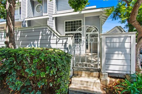 Photo of 19121 Queensport Ln #A, Huntington Beach, CA 92646 (MLS # TR26075573)