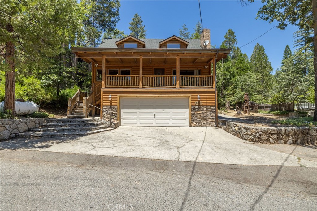 Beautiful Bass Lake Home in Desirable Willow Cove – Close to Your Boat Slip!
Offered in the Heart of Willow Cove | Minutes from Yosemite | Turn-Key Vacation Rental
Welcome to your mountain retreat! This stunning two-story home is located in the highly sought-after Willow Cove subdivision of Bass Lake. Just a short walk to The Pines Village, your own boat slip on Island Dock, and a quick drive to Yosemite National Park, this home offers the perfect blend of tranquility and convenience. Property Highlights
• • 3 Bedrooms | 3 Bathrooms | Large Bunk Room
• • Elevated main floor with extensive storage space underneath in garage
• • Beautiful cedar lock siding and floor-to-ceiling rock fireplace
• • Expansive game room with pool table – ideal for entertaining
• • Updated kitchen with modern appliances and finishes
• • Abundant windows showcasing scenic forest views
• • Large covered front porch and multiple outdoor seating areas
• • Home is sold fully furnished – move-in ready!
• • Boat slip included Investment Opportunity
Currently a high-performing vacation rental with exceptional guest reviews. This property is ideal as a primary residence, vacation home, or income-generating rental in one of Bass Lake’s most coveted neighborhoods. Location Benefits
• • Short walk to The Pines Village (restaurants, shops, marina)
• • Minutes to Bass Lake recreation and hiking trails
• • Just a short drive to Yosemite National Park
• • Located in the prestigious Willow Cove community
Schedule a Private Viewing Today!
Don’t miss this rare opportunity to own a slice of paradise in Bass Lake. Contact us now to schedule your showing or request more information