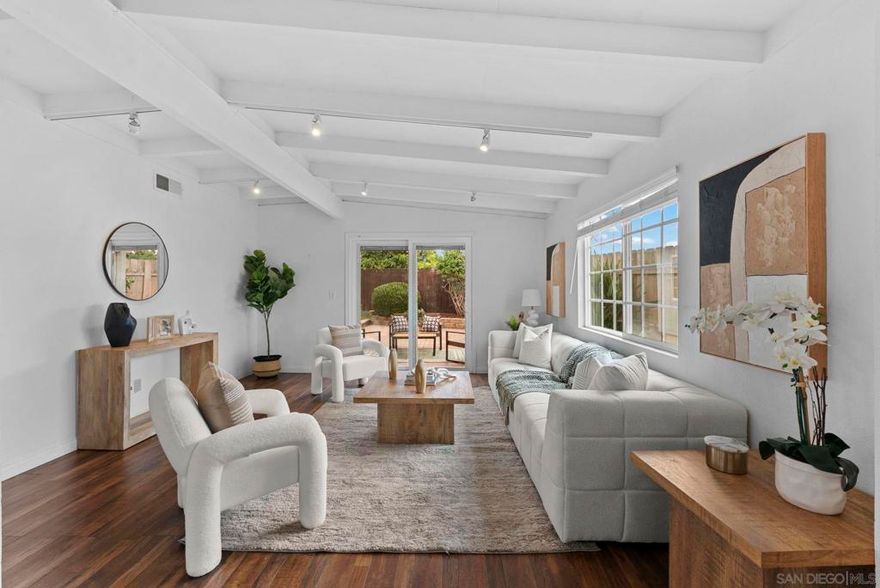 Best priced home in Clairemont! Fall in love with your next home in the most centrally located community. With 4 bedrooms and 2.5 bathrooms, there is plenty of space in this single story home. Step inside and immediately notice the vaulted ceilings that help make this home light, bright and open.  This home features an oversized primary bedroom with a walk-in closet and full ensuite bathroom plus 3 additional bedrooms with lots of storage and closet space.  The large kitchen has plenty of storage and pantry space and new appliances. There is a separate full size laundry area off the kitchen. Eco-friendly and cost-saving amenities include 15 solar panels, a new HVAC system (central air!), and a tankless water heater.  Enjoy your fenced yard with new low maintenance turf, a fun custom putting green, a covered pergola for shaded relaxation, and rainwater conservation with new gutters, downspouts, and a rain barrel. Attached 1 car garage plus additional driveway spots and lots of street parking.  With easy access to several highways, you are 15 minutes or less to downtown, beaches, UCSD, Miramar Air Station, 32nd St./Coronado Naval Bases, Convoy District, Mission Valley, and so much more. It does not get more central than this home! Come see what makes this home stand out in Clairemont!