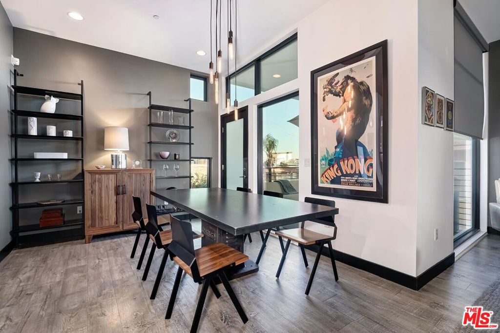 This designer done unit is in a prime and trendy neighborhood of West Hollywood. Enter into the unit through a private entrance, the ideal single family alternative. Impeccably renovated, there is hardwood flooring spanning across an open floor plan. The kitchens feature stainless steel appliances & a counter that doubles as a breakfast bar. Perfect for entertaining, there is also a half-bath for guests. Both bedrooms have full attached spa-like custom bathrooms with European sinks and built-out walk-in closets. Top quality appliances throughout the home made for the most seamless and luxurious lifestyle. The building was totally redone over the summer; new siding, stucco, resurfaced decks and balconies. Reserves are over 700K. Don't miss the opportunity to fall in love with this unit for its prime location, luxurious lifestyle, ultra-modern design, generous open floor plan and beyond. A must see!