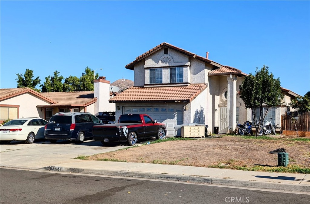 Wonderful family home in an established neighborhood. Great opportunity to own a home with "good bones" and a swimming pool! Enlarged family room, enclosed patio and low maintenance backyard will inspire your personal touches as you live and dream in your new home. Close to many amenities and a commuters easy access to the 60 and the 215 freeways.
