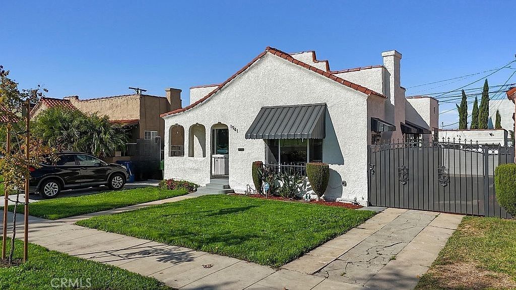 Photo of 1941 W 68th Street, Los Angeles, CA 90047 (MLS # OC25256635)