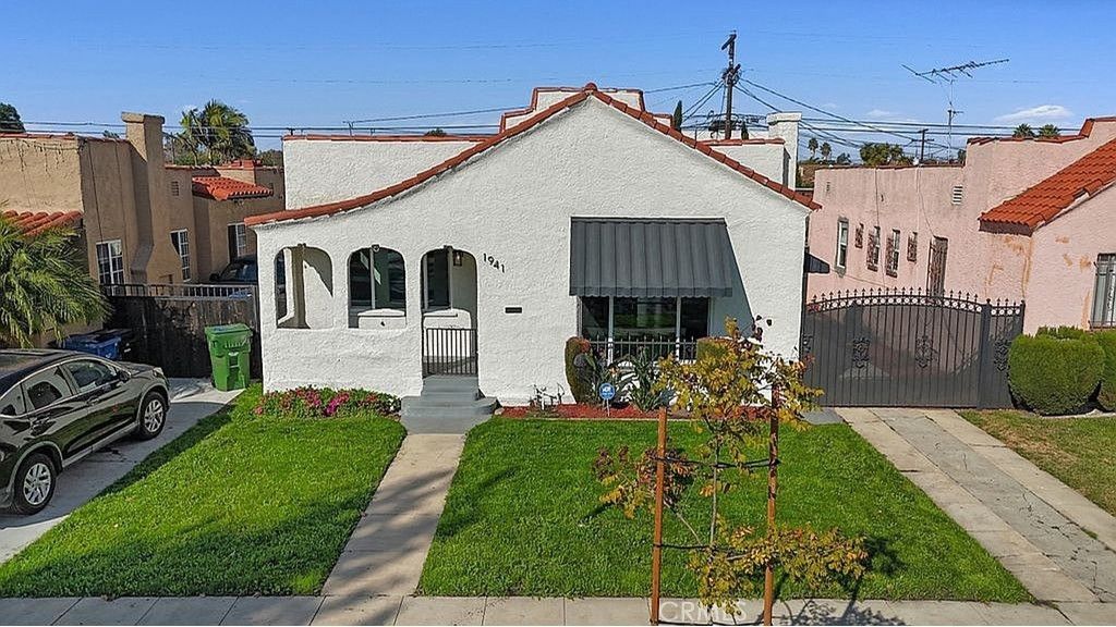 Photo of 1941 W 68th Street, Los Angeles, CA 90047 (MLS # OC25256635)