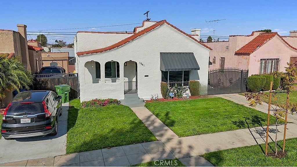 Photo of 1941 W 68th Street, Los Angeles, CA 90047 (MLS # OC25256635)