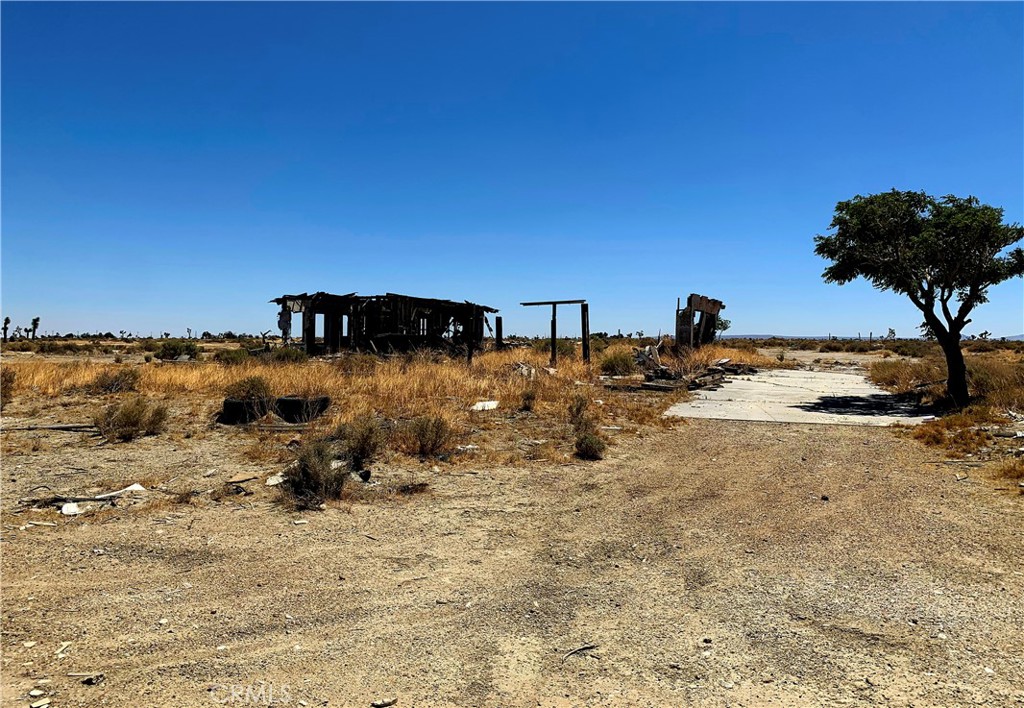 The housing property doesn't exist as the property was completely burned and what is being sold is the land. It has well water, property is on propane for gas, and a septic tank. The land has no utilities. Drive-by only.