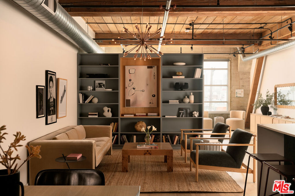 Welcome to #443 at Barker Block! Beautifully renovated with exquisite attention to detail, this stunning loft was fully reimagined by Los Angeles based firm, Rebuilt Inc Design. Magnificent windows span the entire west wall, flooding the home with fabulous light and views of the downtown skyline. Located in the desirable Arts District, this residence boasts an open loft plan with two bedroom areas, wonderful chef's kitchen, and exceptional storage throughout. A recent renovation elevated this unit to a level of quality and craftsmanship rarely available on the market today. This unit also includes dedicated parking with EV charger. A true opportunity to lease a fully custom designed, turn-key residence, centrally located with easy proximity to the best restaurants, shops and all downtown has to offer.