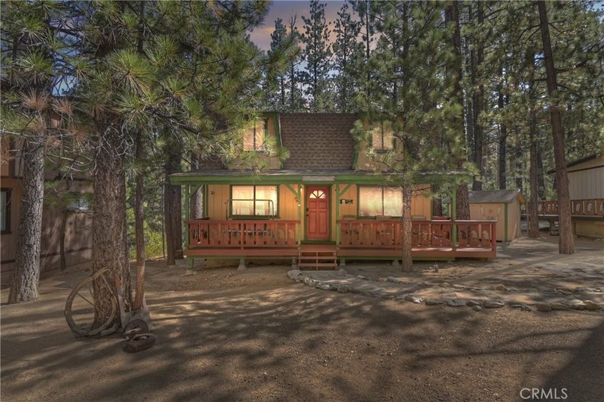 Welcome to this adorable mountain cabin ~ Located in the Pinewood Estates and backing to residential acreage ~ Imagine yourself relaxing in the hot tub on the back deck soaking in the peace and quiet feeling as though you are in the forest all by yourself ~ Enjoy picnics in the backyard listening to the sounds of the seasonal stream babbling along ~ Spend those chilly winter evenings cuddled up with your loved ones in front of the wood burning fireplace, basking in real quality time together ~ As you pull up you feel lighter as the stressors of everyday life are washed away with each deep breath of the clean mountain air ~ The 2 bedrooms and 1.5 bathrooms with over 1,000 sf. ft. of living space affords you room to gather with family and friends creating lifelong memories ~ Whether you are an outdoor adventurer, snow sports enthusiast or someone looking for a quiet retreat, this cabin is where you will want to put your roots!