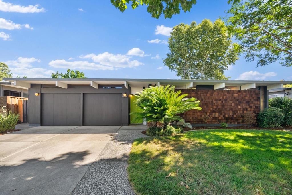 Coveted atrium model Eichler home with well preserved Eichler elements throughout, such as vinyl tile flooring, radiant heating, globe lighting, mahogany paneling, and formica countertops in kitchen and baths. The central open air atrium has a koi pond feature, river rock surround and multiple access points into the home. Inside youll find an open living and dining space with a brick wood fireplace. The back side of the home features 10 tall tongue and groove ceilings with floor-to-ceiling panels of glass, providing light and sightlines into the low maintenance landscaped yards. The kitchen and family sitting area has formica countertops, flat panel wood and laminate cabinetry, spacious peninsula with bar seating, gas range and sliders to both patio and atrium. The primary suite has a walk-in closet, en suite bath and sliding door access to the backyard. The hallway bath has an iconic boomerang formica countertop and door to the side yard. Attached two car garage. Built-up Modified Bitumen Roof. Idyllic location with Booksin Elementary and active Fairglen Eichler community block parties. Close to Wallenberg, Kirk and Lincoln Parks and just minutes to downtown Willow Glen shops, restaurants, library and weekly Farmers Market, as well as downtown Campbell and Pruneyard Shopping.