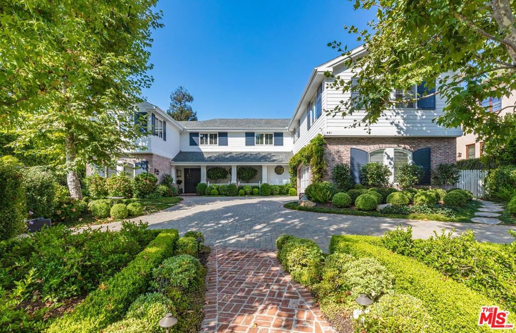 Almost brand new stunning Brentwood Park residence with open floor plan and "new-home" design elements that bring families together. Exquisite rooms with high ceilings and tall doors focus on seamless transition between indoor and outdoor living spaces. The crown jewel of the five-bedroom, six-bath home is an extraordinary, brand new, chef-grade kitchen, that can serve as a busy family's central hub or the hot spot of a couples dinner party. The "Drop-Dead gorgeous" master has 2 generous baths and 2 huge fabulous closets, plus gym. The grounds are magical, with leafy trees, flowering hedges and a parade of dwarf magnolias bordering the rear lawn. A putting green, pool and an enchanting outdoor dining terrace with fireplace inspire fun activities, relaxation and entertainment. A refreshingly chic environment, it appeals to those who want fresh and new, blended with timeless style. Create memories to last a lifetime. Must see, because the photos don't do justice to this beautiful home.