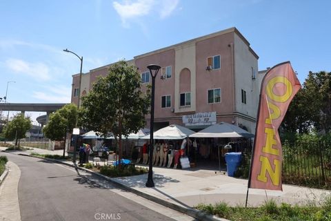 Photo of 11310 S Olive ST, Los Angeles, CA 90061 (MLS # MB26114365)