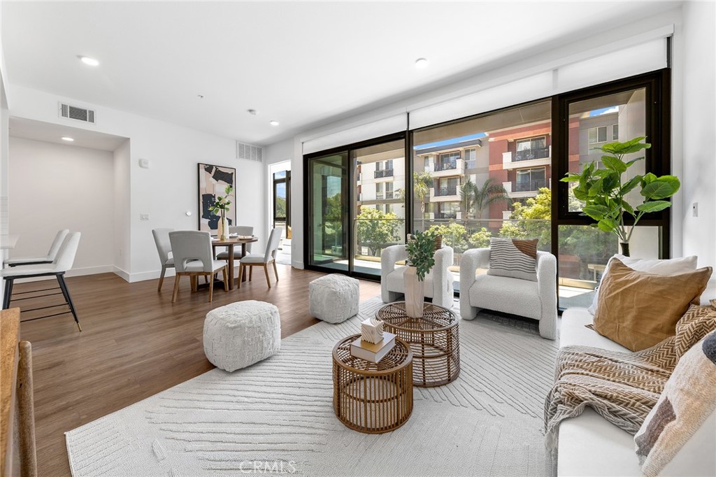 MW Lofts Pasadena represents the pinnacle of modern urban living in one of Southern California’s most desirable locations. For sale for the first time, this brand new condominium project features 115 units. Unit 228 is a 2 bedroom, 2 bathroom floor plan, spanning 1,249 SF. The spacious kitchen comes with tons of countertop space, and opens into a great room with an abundance of sunlight. Huge floor-to-ceiling windows lead to an oversized balcony, and extend to the primary bedroom. The primary bedroom is en-suite with dual sinks and bathtub, and laundry is included and in-room. Window shades are included.
This sophisticated condominium combines cutting-edge design with refined elegance, offering spacious, open-concept floor plans, high-end finishes, and panoramic views of the surrounding city and mountains. Each residence artfully crafted with premium materials and expansive windows that flood the interiors with natural light. Residents of MW Lofts enjoy exclusive amenities, including controlled access, a state of the art fitness center, private rooftop lounge, and terrace, all in close proximity to Pasadena’s finest dining, shopping, and cultural landmarks.