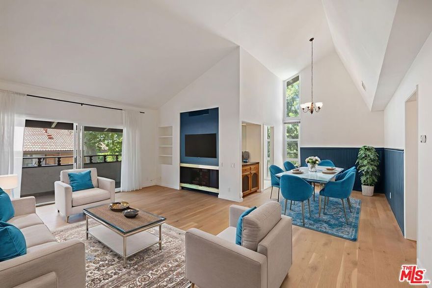 Welcome to a sun-filled top-floor retreat in the heart of Westlake Village, where an abundance of natural light and elegant upgrades combine to create the ideal blend of style and comfort. This beautifully refreshed condo features new wide-plank European white oak hardwood floors that flow seamlessly throughout the open-concept living, dining, and kitchen areas, perfect for modern living. The kitchen boasts sleek granite countertops and stainless-steel appliances that cater to everyday needs and entertaining alike. Vaulted ceilings and large windows amplify the bright and airy ambiance, while a sliding glass door open to a private balcony offering serene tree views and a peaceful outdoor escape. The generous primary suite is a true haven, complete with an ensuite bathroom and a large walk-in closet. A second bedroom and additional bath provide flexible options ideal for guests, a home office, or a hobby studio. The unit is also perfectly positioned in the back of the community, where there is no street noise, and has two individual parking spaces. Residents enjoy resort-style living with access to community amenities, including sparkling pools, lush common areas, a BBQ, and convenient guest parking. Situated in an award-winning school district, with top-rated elementary, middle, and high schools nearby, this condo offers both exceptional value and lifestyle. This move-in-ready, light-filled home is an opportunity not to be missed. Schedule your private showing today!