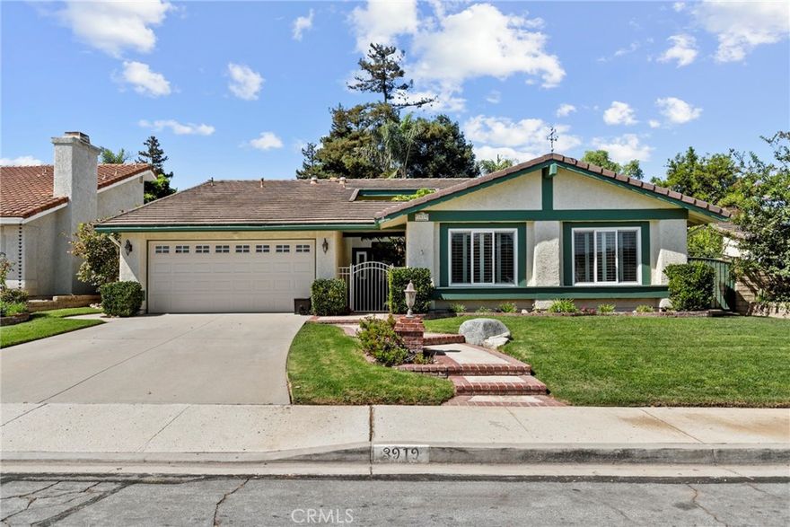 Beautiful move-in ready single-story home in a family-friendly neighborhood! Featuring 4 beds, 3 baths, and 2,186 sq ft of living space, this home offers an open floor plan with vaulted ceilings, hardwood floors, new carpet, and custom fireplaces. The kitchen is a chef’s delight with granite countertops, tile backsplash, and a Bosch dishwasher, opening to a breakfast nook and a formal dining area. Plantation shutters throughout, energy-efficient windows, a sliding glass door, and a French door enhance the home's style and functionality. Entertainer’s yard includes a spool with high efficiency heater (spa/pool combo), covered patio, built-in BBQ, lush landscaping, and a shed. Enjoy a private courtyard, garage with built-in cabinets, and 300 sq ft of usable attic space. There is also a local park nearby. Don't miss this rare find.