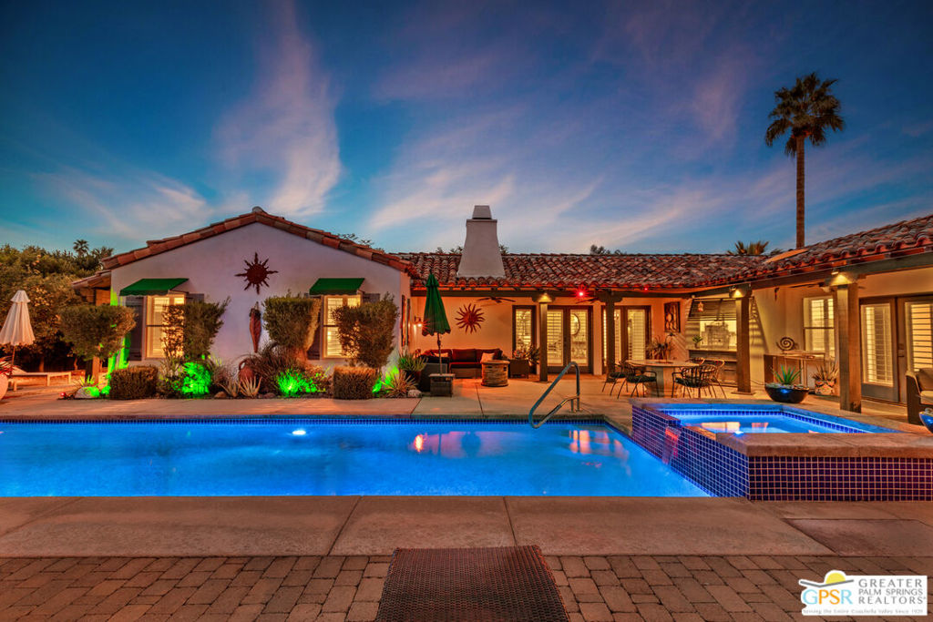 HUGE Price Reduction! Priced for quick sale. Iconic Estate in the Movie Colony. Own an extraordinary piece of Palm Springs in the exclusive Movie Colony, a neighborhood renowned for its Hollywood history, walkability, and NO HOAs. This expansive estate, set on private owned land, gives seclusion just moments from downtown Palm Springs. Built in 1990, is designed for grand living and entertaining, with spacious interiors that flow seamlessly to the outdoors. French doors open to an expansive patio, meticulously kept huge yard, and a sparkling pool and spa, all framed by the most breathtaking views of the San Jacinto Mountains. The six-bedroom layout includes two private casitas, each with a separate entrance, ideal for hosting guests or generating income as short-term rentals. With a vacation rental license ready for reapplication, the property presents a turnkey investment opportunity. Modern upgrades include Wi-Fi-controlled pool equipment, a solar-heated pool, and a cutting-edge owned solar energy system with 40 panels, all micro inverter, producing approximately 1,433 kWh per month. The updated kitchen features sleek quartz countertops and high-end finishes. Surrounded by vibrant bougainvillea, mature trees, and lush custom landscaping, the estate offers year-round beauty and tranquility. Don't miss this opportunity to own one of Palm Springs' most desirable properties in the most desirable neighborhood. The possibilities are endless with this incredible estate. Don't miss out on this one!