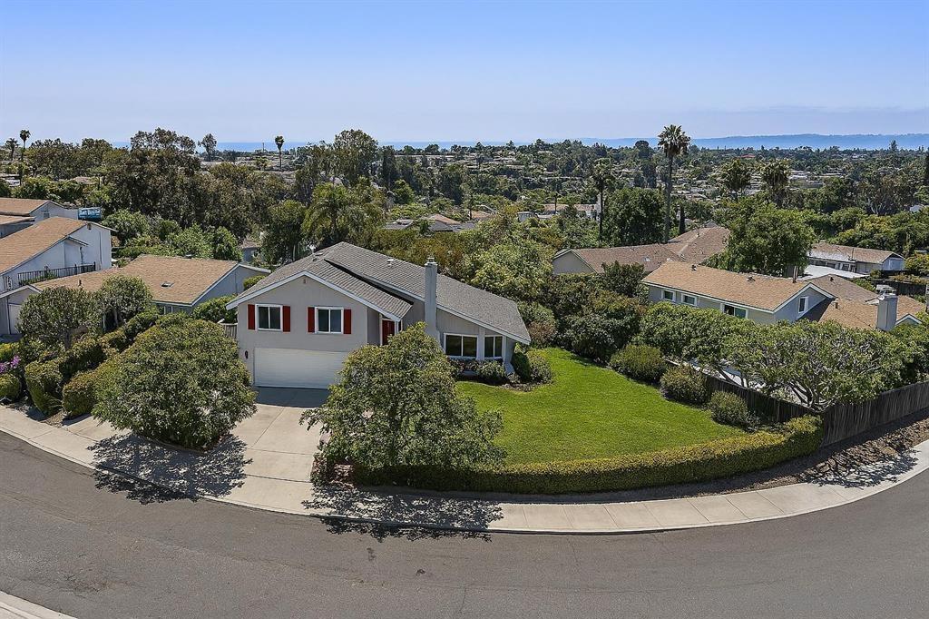 This gorgeous two-story home in the heart of University City offers a perfect blend of comfort, style, and convenience. Boasting 3 spacious bedrooms and 2.5 beautifully remodeled bathrooms, this 1,918 sq ft home is situated on a generous 6,200 sq ft lot. The light-filled living room features soaring vaulted ceilings and a cozy fireplace, creating a welcoming atmosphere. The chef’s kitchen is a dream, with sleek newer stainless steel appliances, including a gas range, and ample counter space. A separate family room with a built-in wet bar provides a great space for entertaining or relaxing. The dining room offers a perfect setting for meals with family and friends. Enjoy the benefits of fully paid-for solar electricity, making your home both eco-friendly and energy-efficient. The detached, insulated room offers endless possibilities — whether it’s a home office, playroom, or creative space, you can tailor it to fit your needs. The expansive front yard is perfect for outdoor activities, with plenty of space for kids and pets to play. The primary suite features a large walk-in closet and access to a newly updated deck, perfect for enjoying morning coffee or evening sunsets. This home is ideally located near excellent schools, a nearby park, and a wealth of local amenities. You’ll be just minutes from world-renowned shopping, restaurants, the UCSD campus, trolley stations, La Jolla beaches, and scenic hiking trails. All ultility wires are undergound! Plus RV/boat parking on-site. A truly exceptional value— don’t miss out on this beautiful University City home!