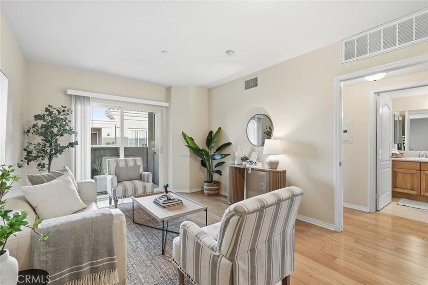 Luxurious Resort-Style Living at Breakwater Village. 

Welcome to the South Bay’s most desirable 55+ coastal community, Breakwater Village!

This beautifully updated top-floor, turnkey 2-bedroom, 2-bath condo offers high-end finishes throughout. The spacious kitchen features granite countertops, stainless steel appliances, custom cabinetry, a breakfast bar, and a stacked laundry closet. The open-concept living area flows seamlessly to a private balcony with courtyard views—perfect for relaxing or entertaining. The home has been updated with wood flooring throughout (grandfathered in, as the HOA no longer allows new hardwood installations).

The primary bedroom boasts an ensuite bathroom and generous walk-in closet, while the second bedroom is bright and airy with its own attached updated bath. Additional conveniences include two tandem parking spaces in the gated garage and a private storage unit.

Enjoy resort-style amenities including a heated pool and lounge deck, outdoor fireplace and BBQ area, fitness center, private media room, and clubhouse complete with kitchen, dining area, and billiards. Breakwater Village offers a friendly, low-maintenance lifestyle with a professionally managed HOA and a vibrant social calendar featuring movie nights, card games, bus trips, and more.

This secure, gated community also provides ample guest parking and an unbeatable location just minutes from the beach, top restaurants, South Bay Galleria, major freeways, and public transit.